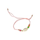PULSERA DE HILO ENCERADO CON STRASS Y CARACOL